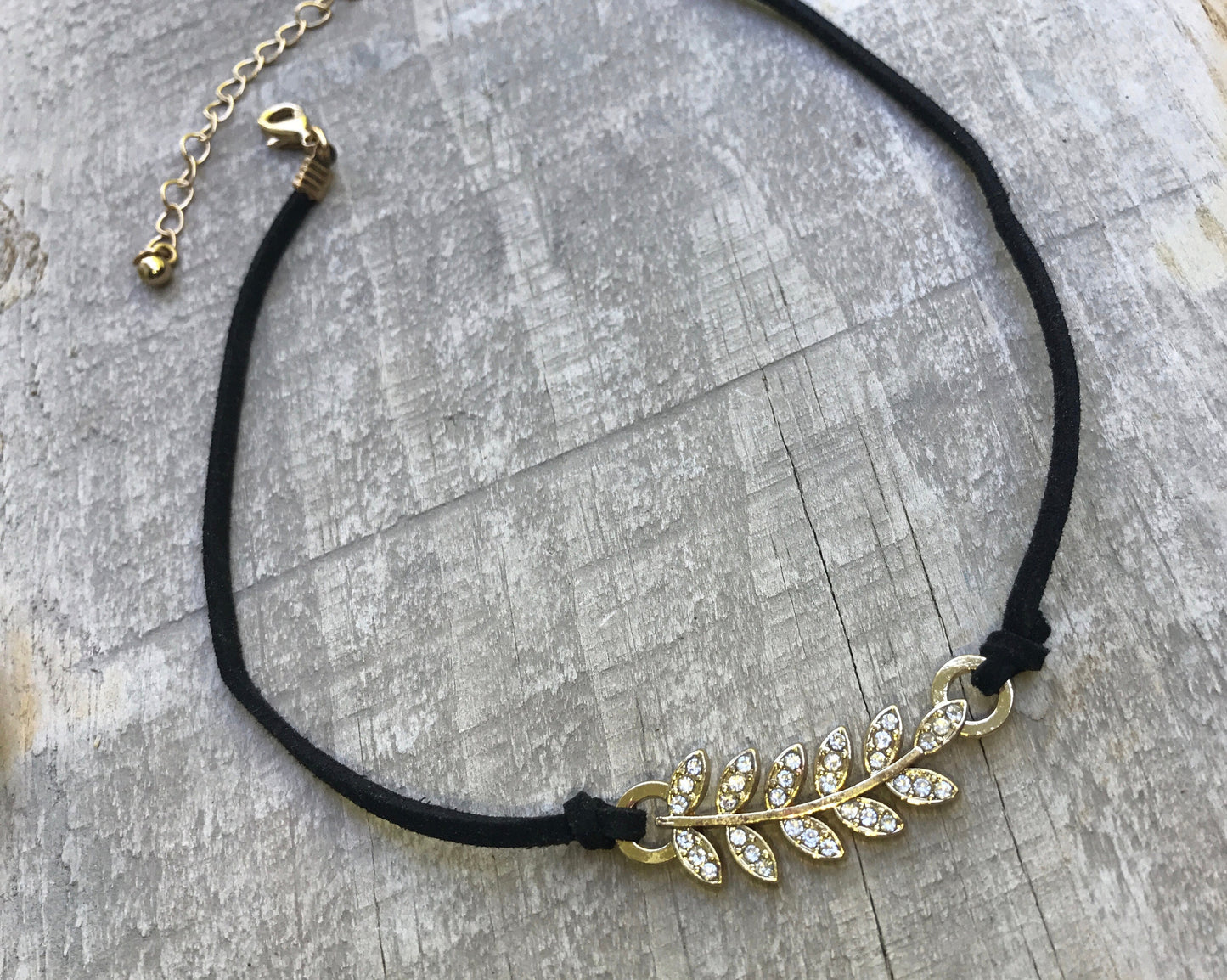 Vintage Rhinestone feather on black vintage necklace