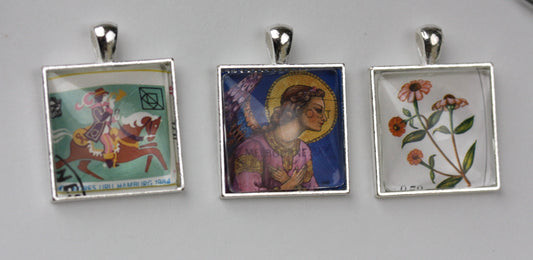 Necklace pendants made from genuine vintage and antique postage stamps from around the world - Australia, Argentina, Afghanistan, folk art