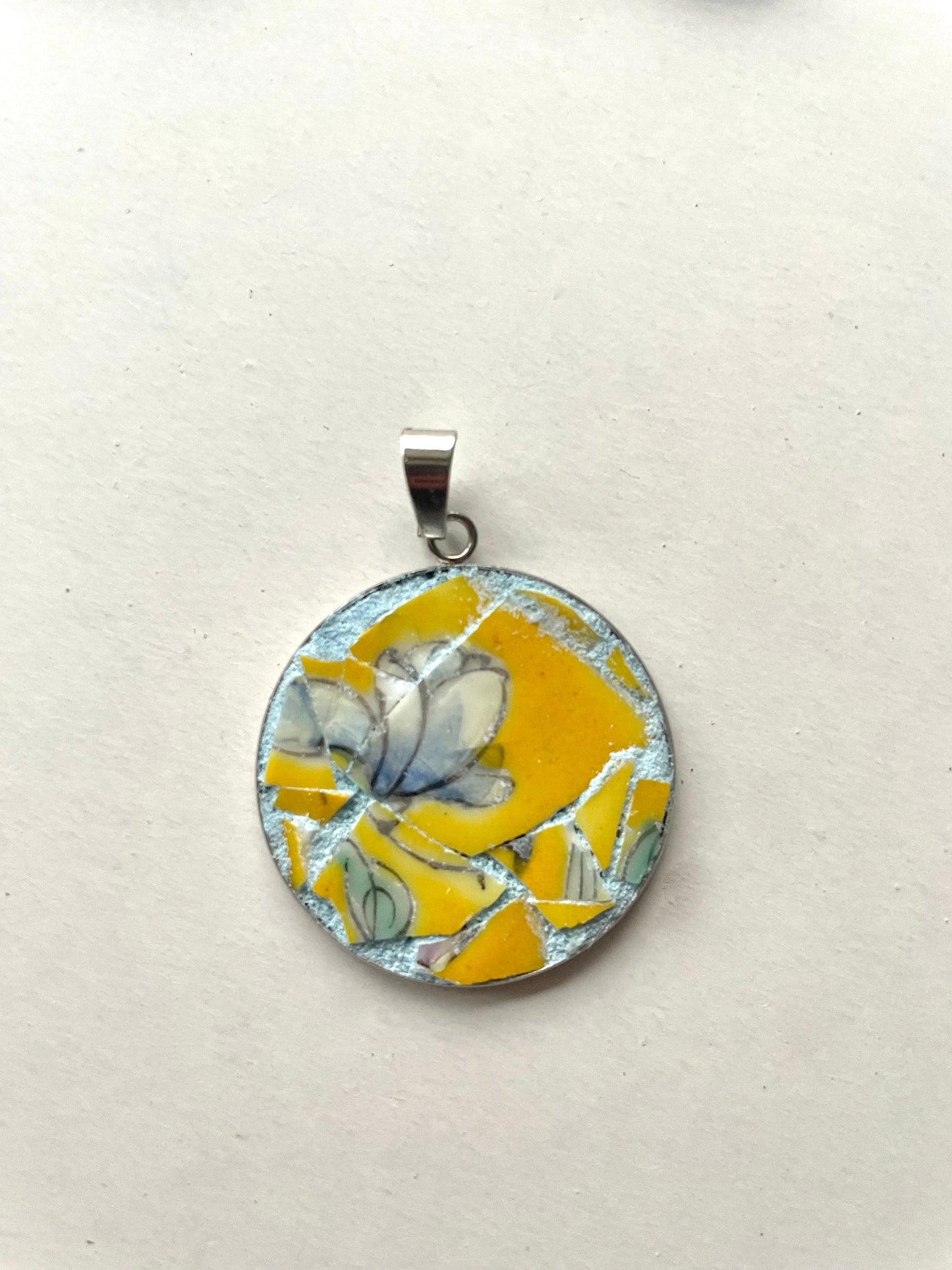 One-of-a-kind mosaic necklaces made from broken vintage dishes