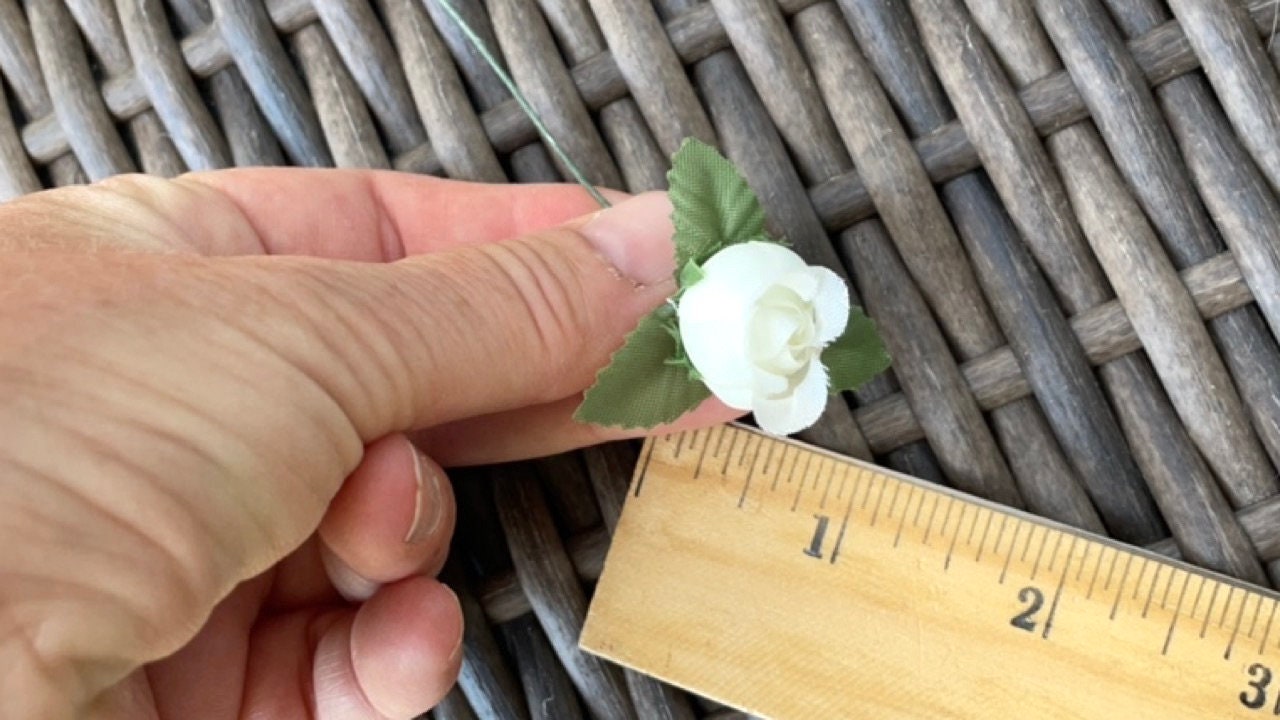 Three dozen (36) individually wire stemmed faux flowers - available in 3 colors - blue, yellow or white