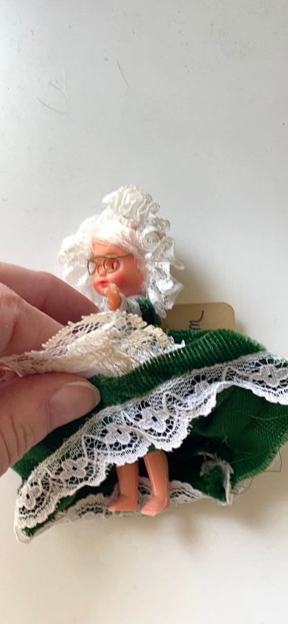 Stunning vintage collectible art baby Doll from Belgium with green velvet dress and lace overlay
