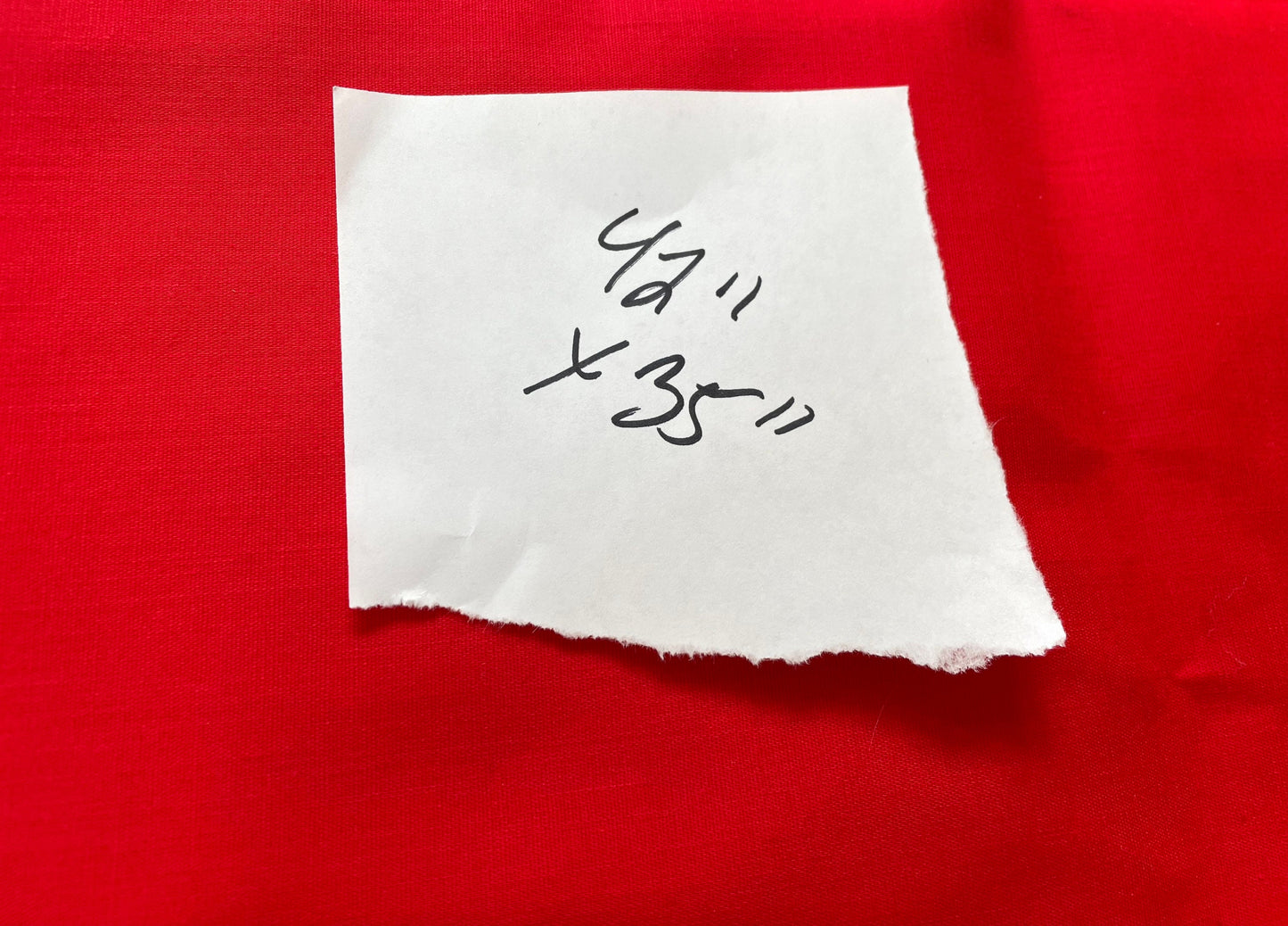 Lot of vintage fabric remnants - reds and blacks, plain and floral