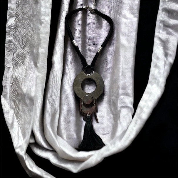 Unique vintage necklace with black suede and silvertone metal