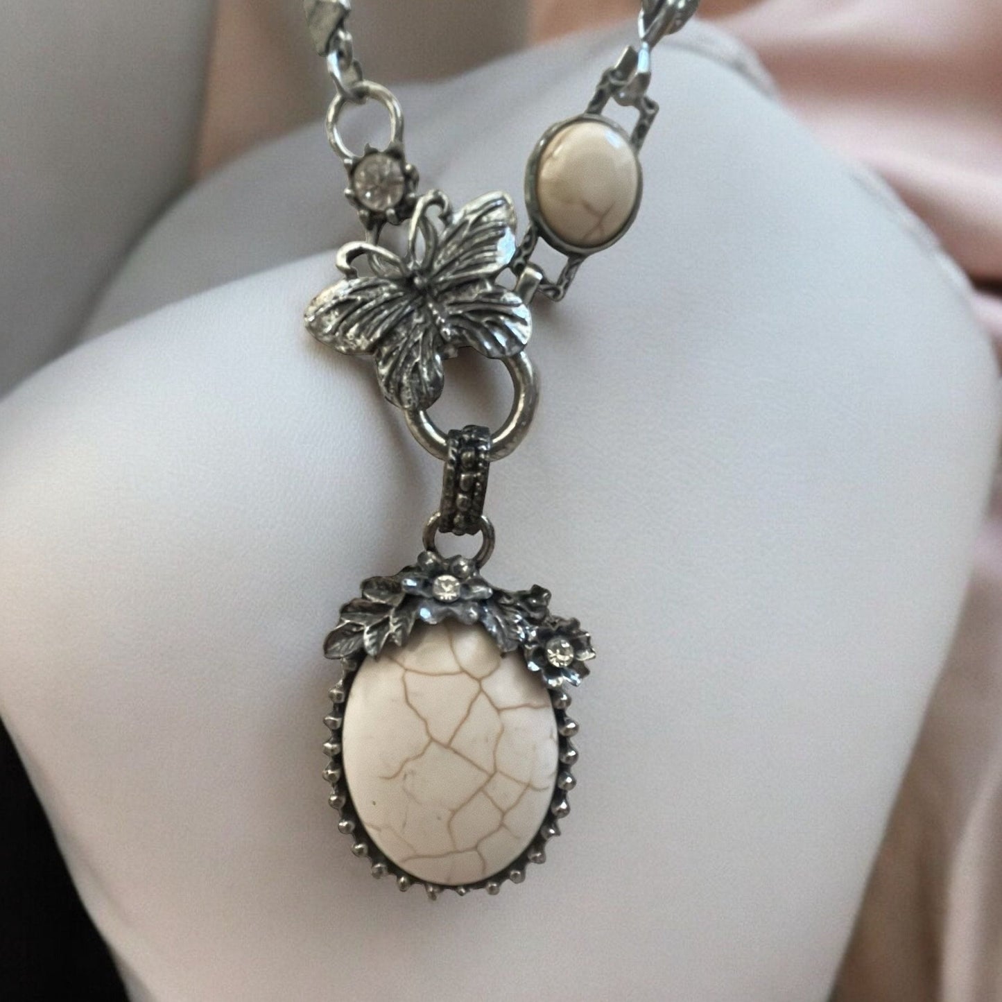 Stunning vintage white faux stone necklace with silver flowers and butterfly