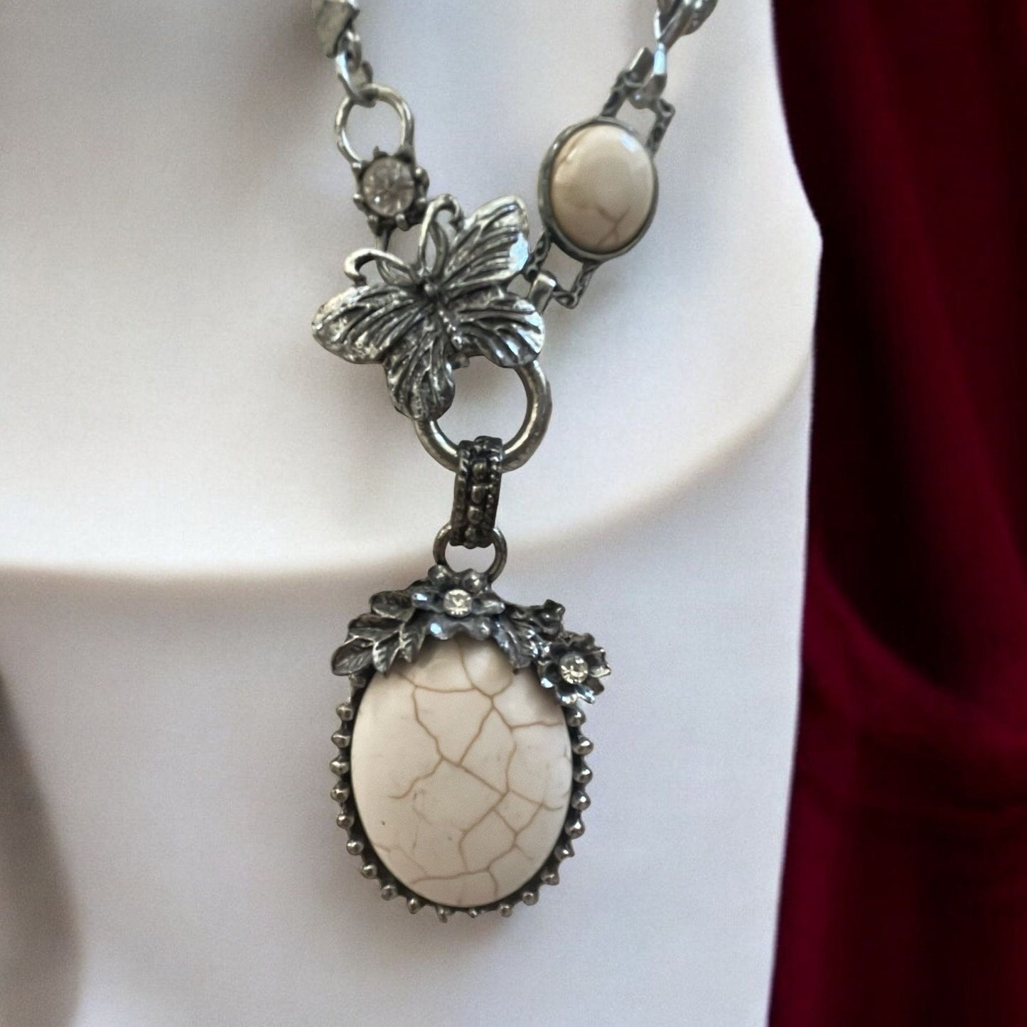 Stunning vintage white faux stone necklace with silver flowers and butterfly