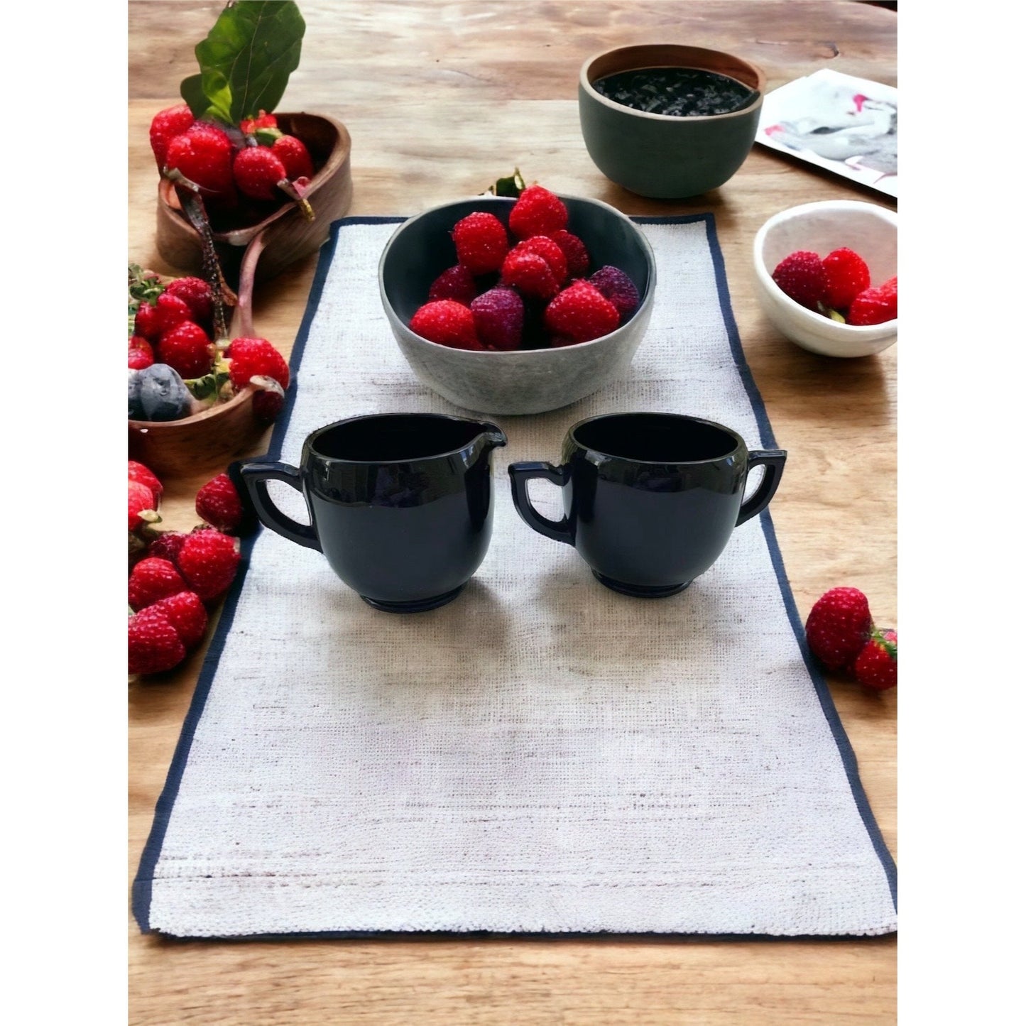 Vintage black glass cream and sugar set